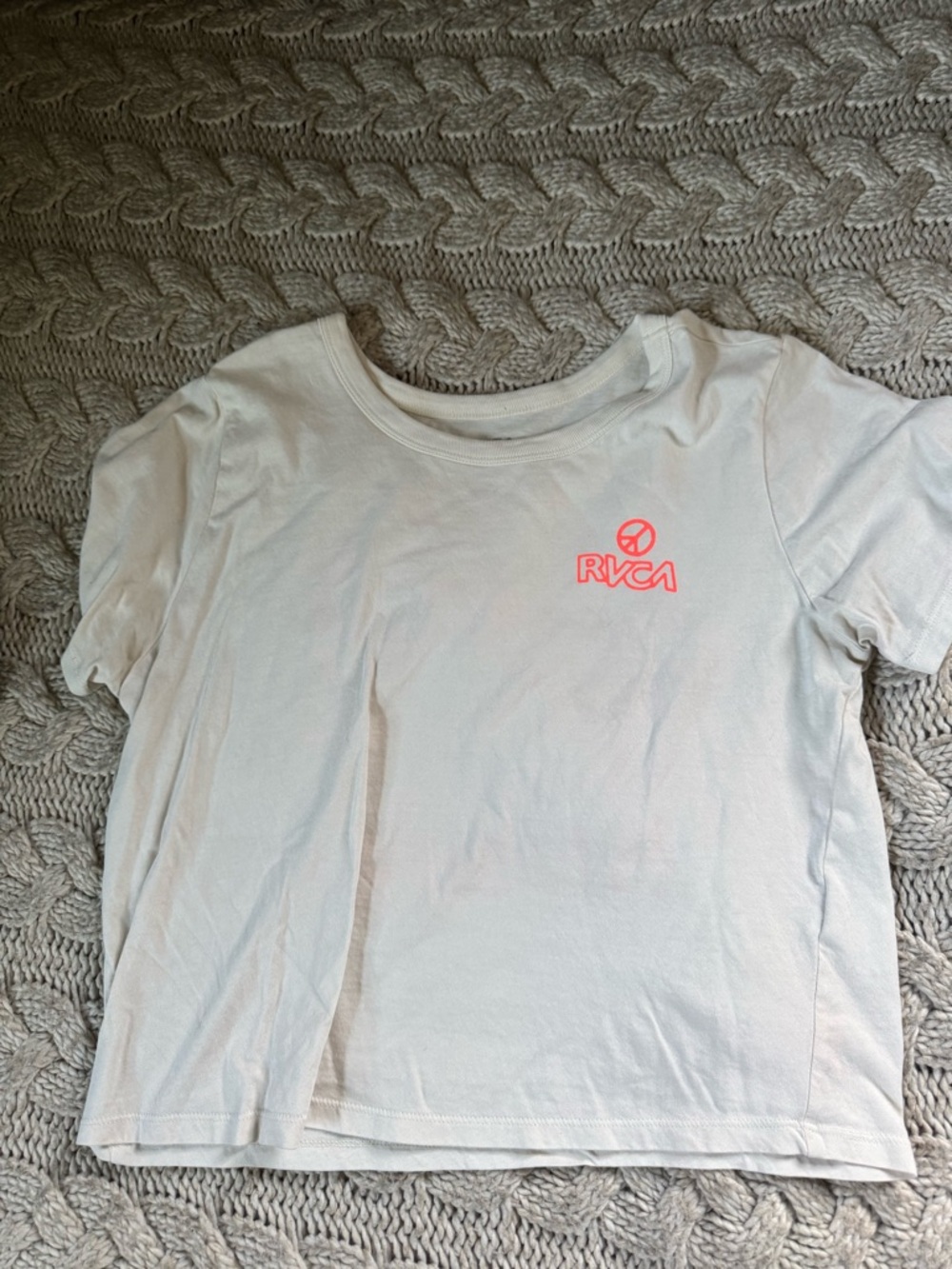 RVCA White Tee with Neon Pink writing -can’t take the heat, stop letting it burn